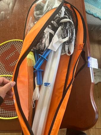 a set of two badminton rackets， badminton and net 2