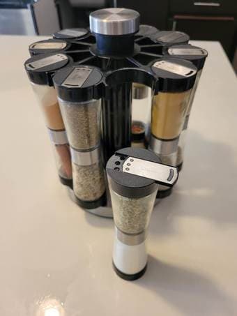 Revolving kitchen spice rack with double-ended spice jars 3