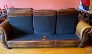 Handsome and comfortable leather couch, about 8 years old. Moving sale 2