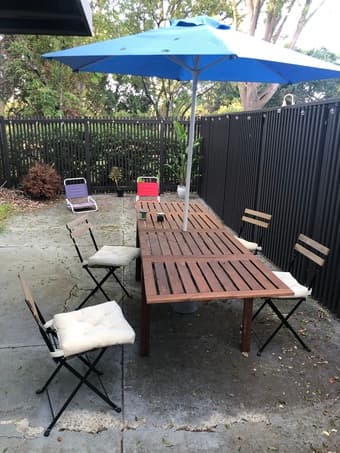 Porch table ($175), 4x wood chairs ($75 total) table umbrella ($30) 3