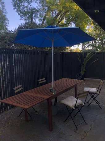 Porch table ($150), 4x wood chairs ($50 total) table umbrella ($20) 2