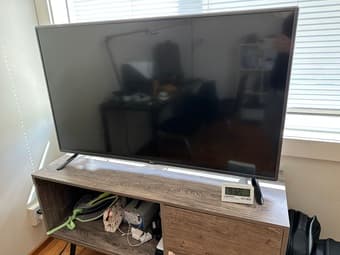 50 inch TV (LG) and TV stand - $75 2