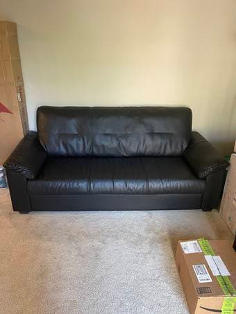 Moving out sale, selling black couch 1