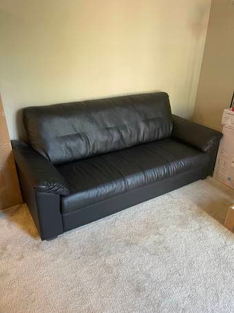 Moving out sale, selling black couch 2