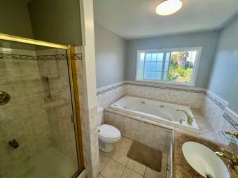Furnished Master bedroom with an attached bathroom is available 3
