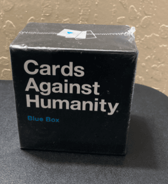 Electric can opener ($20), tea kettle ($7), cards against humanity 3