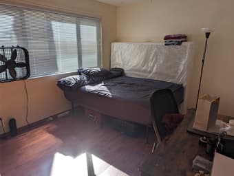 Spacious room available with attached bathroom. 1