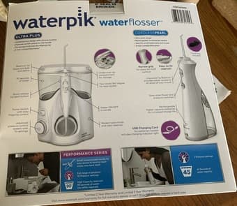 Brand new waterpik counter top flosser ( ultra plus ) 1