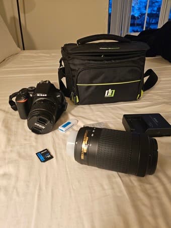 Nikon D3500 DSLR w/ 55 mm lens, bag, memory card 2