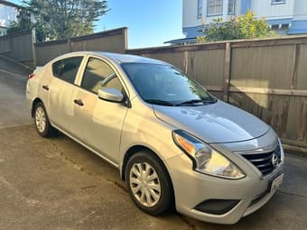 2016 Nissan Versa Silver 90k miles 1
