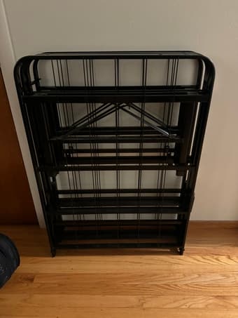 Two single metal folding bed frames 1