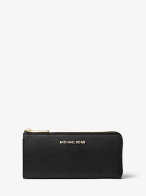 Selling two brand-new Michael Kors wallets 1