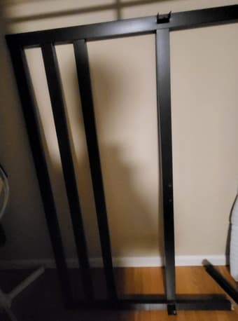 Disassembled queen-size bedframe with headstand 2