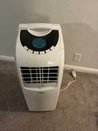 Portable AC with tube for window venting 1