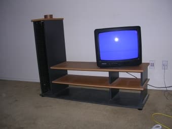 tv stand, end table, fan, couch 3