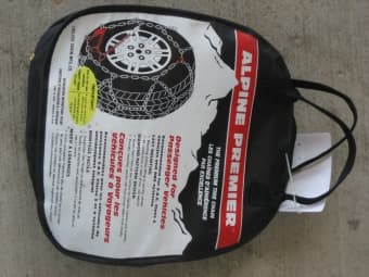 Brand New-never been opened!- Alpine Premier Tire Chains. 1