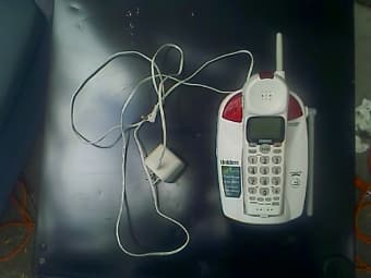 Futon Chair, Fridge, and Cordless phone Cheap! 1
