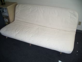 Clean futon with light wooden frame: $90 negotiable 1