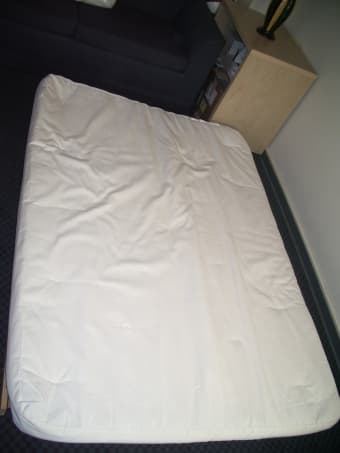 Clean futon with light wooden frame: $90 negotiable 2