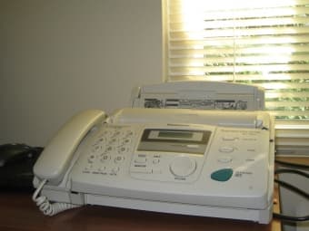 Fax machine and DVD player 1