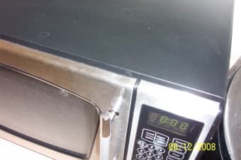 $25 - Retro Looking Stainless Steel Trim Microwave 3