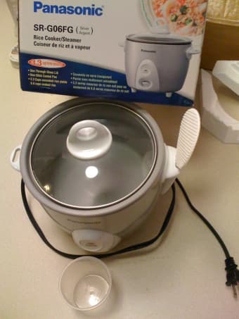 Rice cooker, Coffee press, Can opener, Cheese grater 3