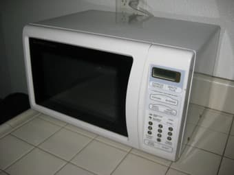 microwave + coffee maker + pots + dish rack + hangers + more - $25 1