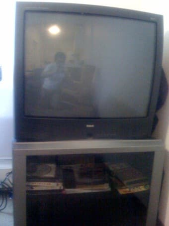 27'' RCA TV + cool TV stand for $20 1