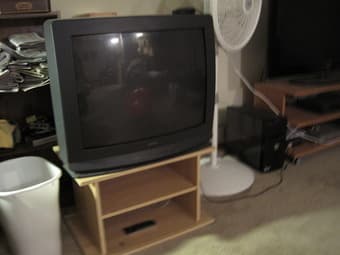 27'' Panasonic TV, Yamakawa DVD player, and IKEA TV stand. TOTAL $45 1