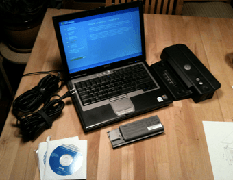 Core2Duo Laptop w/ complete Warranty, extra batt, charger, dock 1