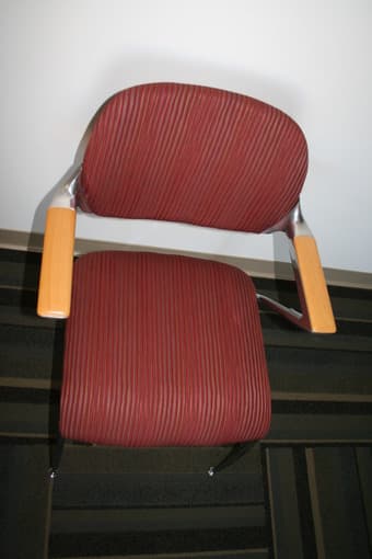 Four red office chairs - $30 OBO each 2