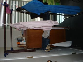 Solid metal Clothes Rack. $8 OBO 1