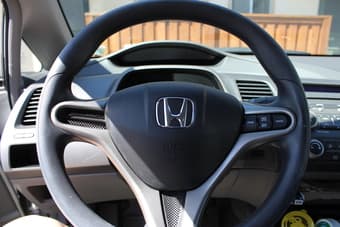 2009 Honda Civic LX 1.8L Sedan 4D with 9,409 miles, selling at $14,699 1
