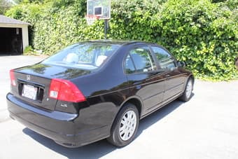 2005 Honda Civic LX, 4-door, black, automatic, 41K miles, $9500 2