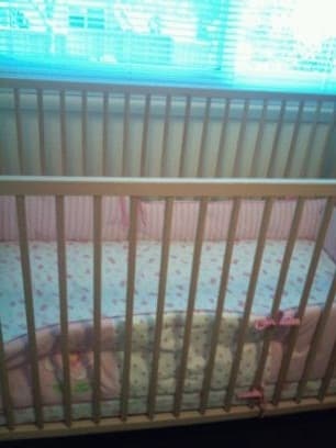 Ikea crib with girl's bedding, $80 1