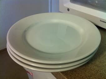 3 white porcelain plates - $8 1
